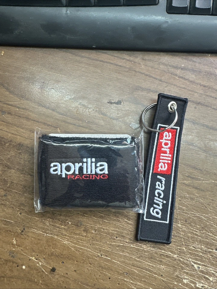 APRILIA RSV 4 POLSINO SERBATOIO OLIO FRENI+PORTA CHIAVI APRILA RSV 4 TUONO V4 Foto 4 de 4