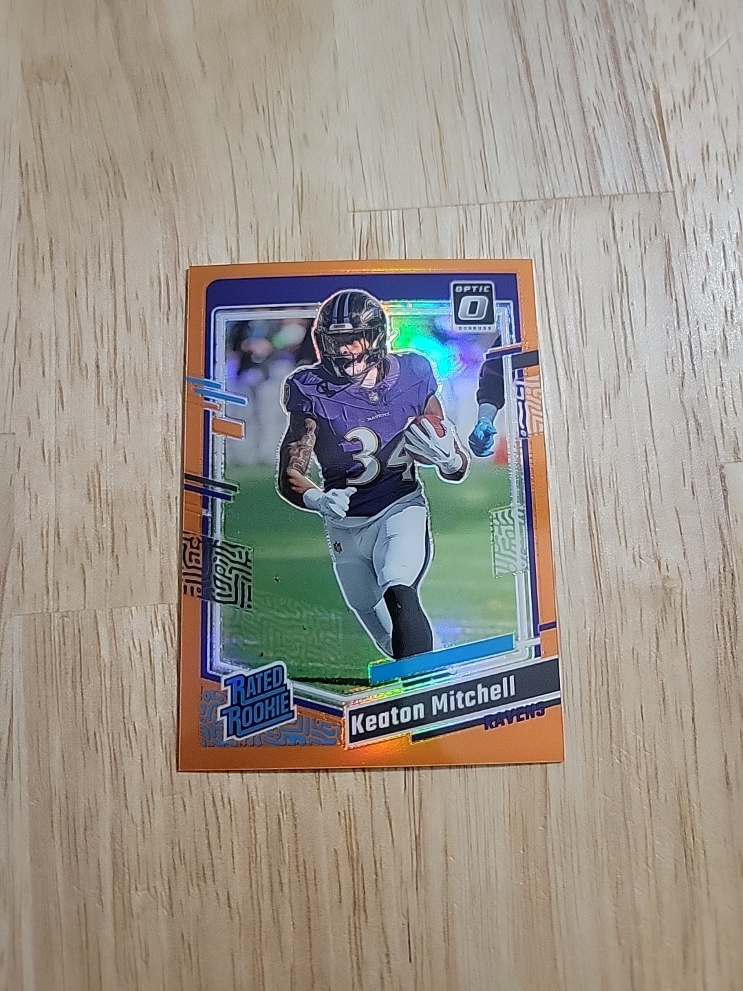 2023 Donruss Optic KEATON MITCHELL Orange Prizm /249 Rated Rookie #207 Ravens SP