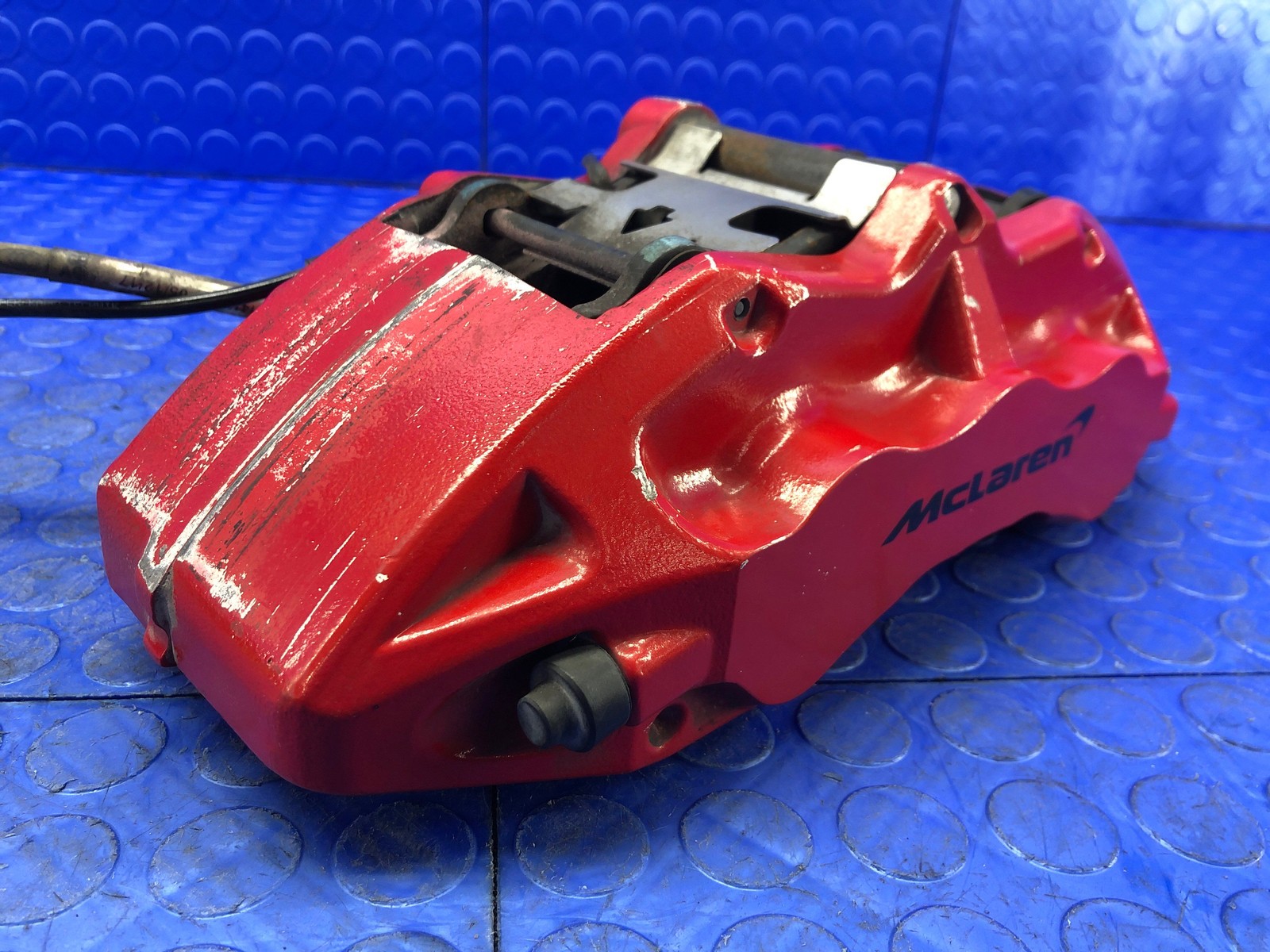 2016-2021 MCLAREN 570S OEM FRONT LEFT CARBON CERAMIC BRAKE CALIPER RED