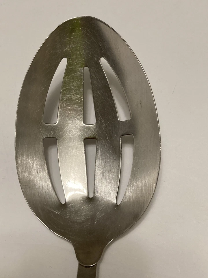 Vollrath Black Plastic Ribbed Handle 11"  Stainless Steel Slotted Spoon - Image 4 of 4