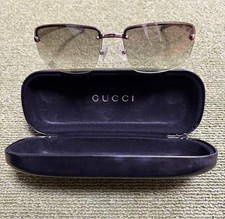 Occhiali da sole Gucci montatura in metallo grigio con custodia inclusa unisex occhiale vintage