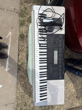 Casio electric piano with pedal and accessories