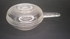 Datom-Co. very small glass frying pan or pot oven ware it says         Z151