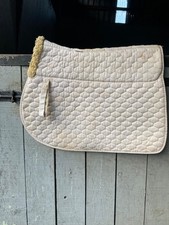 White Saddle Cloth with sheepskin padding. ‘Shires Equestrian’