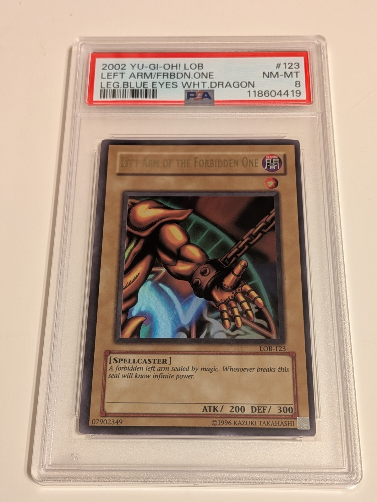 2002 Yu-Gi-Oh! Left Arm of the Forbidden One LOB-123 Legend of Blue Eyes PSA 8