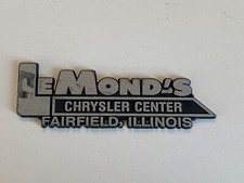 Vintage LeMond's Chrysler Fairfield Illinois Plastic Dealer Badge Emblem Tag