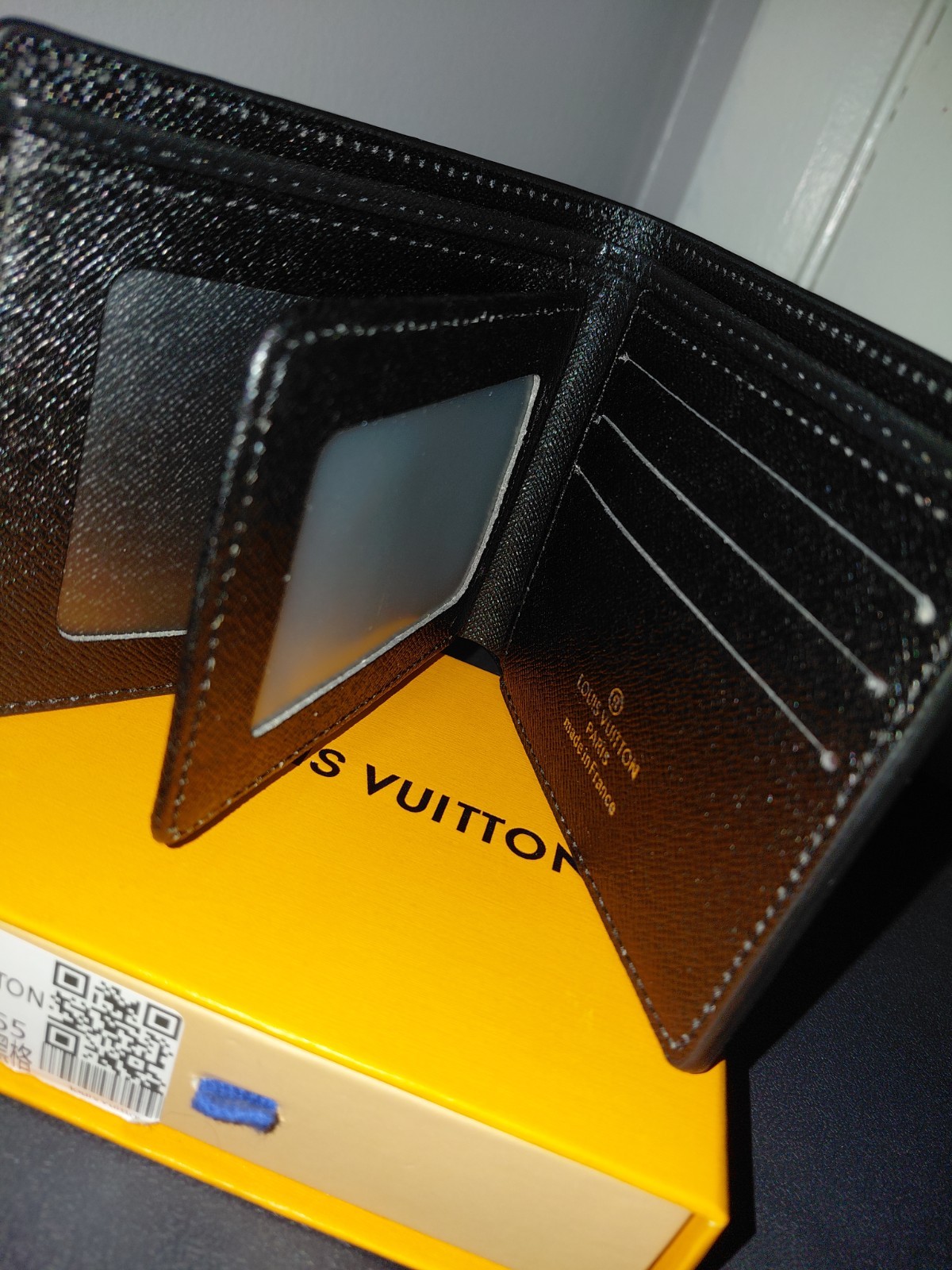 Black wallet with unique pattern designs - image 6