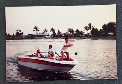 FOUND VINTAGE PHOTO PICTURE Man, Throwing A Coconut From A Boat