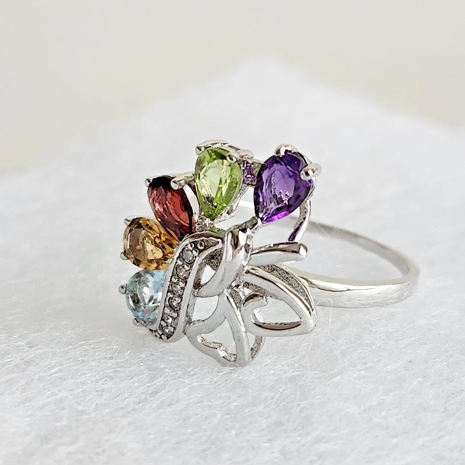 Anillo de plata de ley con múltiples piedras preciosas - amatista, granate y topacio azul talla 8,5 Foto 3 de 4