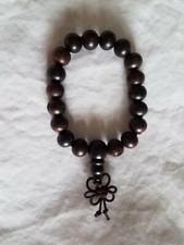 Cedar Wood Buddha Bead Bracelet with Fancy Knot
