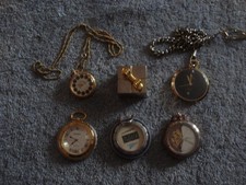 VINTAGE LOT OF 6 COLLECTIBLE POCKET WATCHES ALL 6 NEED SOME TYPE OF REPAIR .