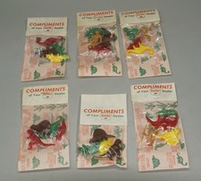 CIRCA 1960S SINCLAIR DINOSAURS PREMIUM FIGURES UNOPENED PACKS LOT OF 6