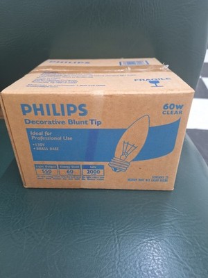 Philips Decorative Blunt Tip Clear 130v 60w Brass Base Box Of 25.  550 Lumens