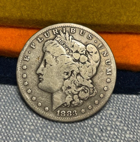 (#100423). Morgan Dollar:  1883 S.  VG.  better date!