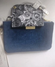 Charging wallet from Andrienne Vittadini studio.