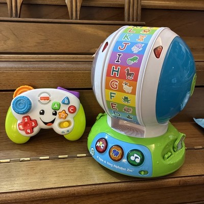 LeapFrog Sing & Spin Alphabet Zoo Letter, Animal Music Works + FP game remote