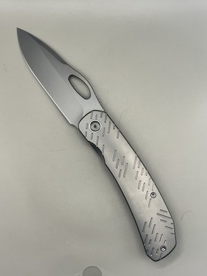 We Knife Inmate Gray Ti CPM-20CV Front Flipper & Thumb Hole Knife 23096B1
