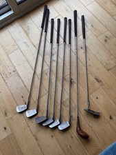 Wilson golf clubs set of 6 plus a driver and a putter