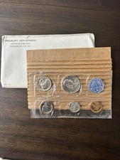 1957 U.S. PROOF SET.  Coins U.S. Mint Sealed in a flat cello. (Tear in envelope)