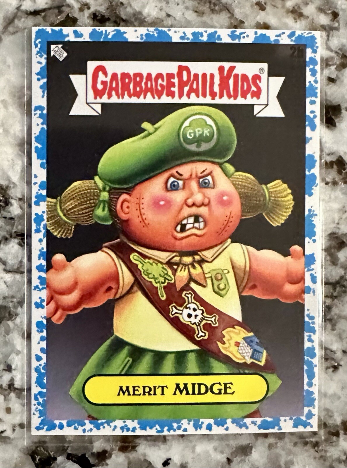 2024 Topps Garbage Pail Kids: Kids At Play Blue #2b Merit Midge front
