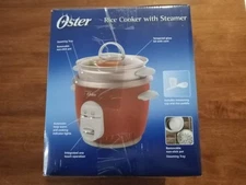 OSTER - 6 CUP RICE COOKER WITH STEAMER - NEW IN BOX