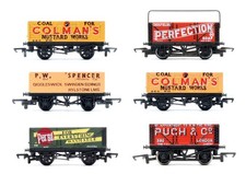MAINLINE/HORNBY 'OO' GAUGE RAKE OF 6 ASSORTED PLANK WAGONS