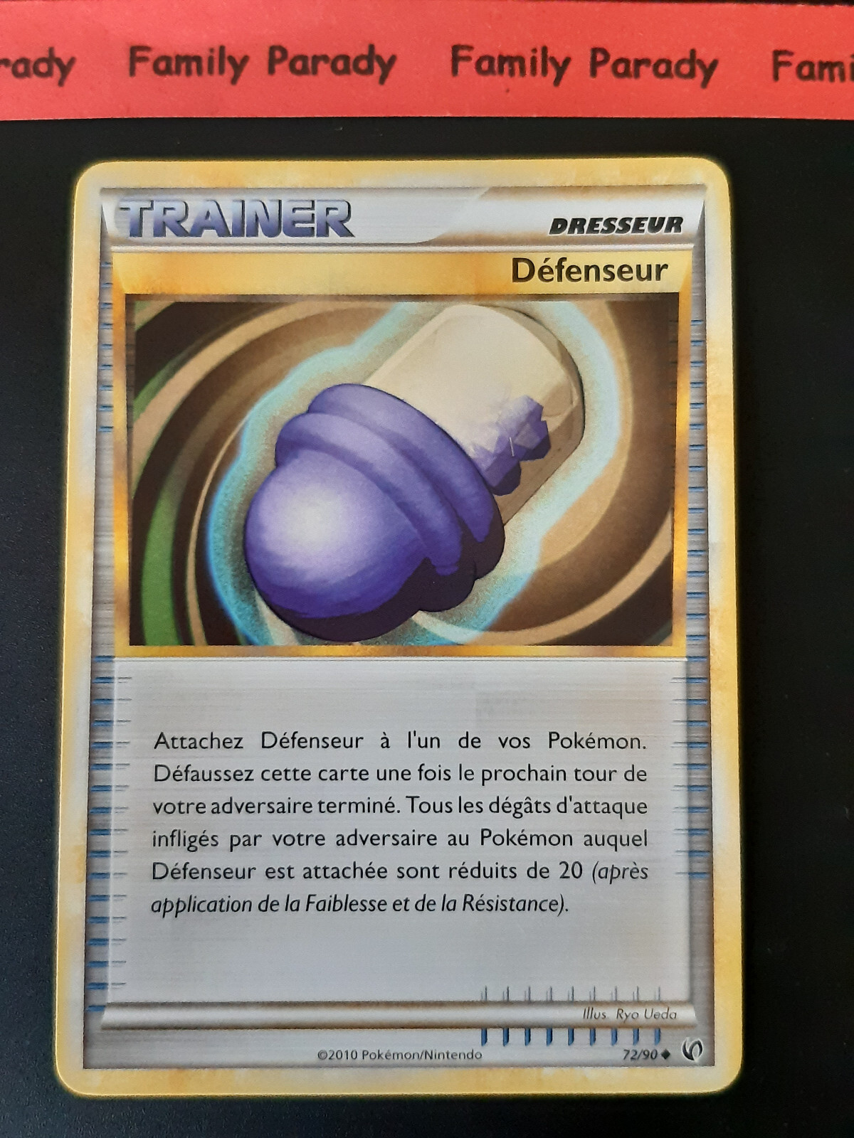 Defender 72/90 Pokemon Card HS UNYIELDING New Fr