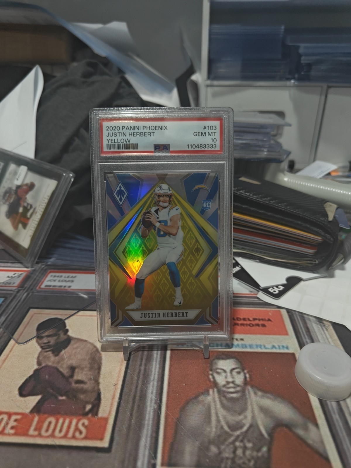 2020 Panini Phoenix - Rookies Justin Herbert #103 Yellow (RC) /75 PSA 10 POP 13