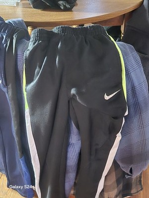 2-pairs Of Boys Pants 1. Nike Pants Blck Grn&wht Down Side. 2place Sport Blue7/8