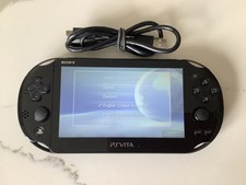 Sony PlayStation Vita 8GB Black Handheld System. Black - with charging cable