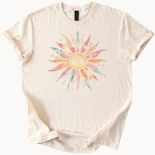 Pastel sunburst watercolor graphic tee with boho summer sun design