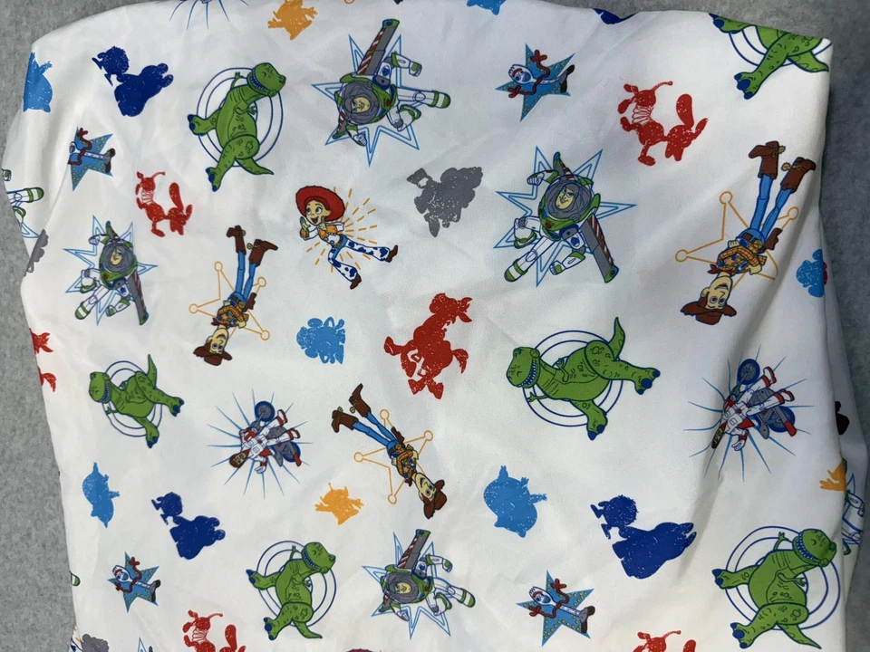 Sábana Ajustable Cuna Disney Pixar Toy Story 4 Woody Buzz Rex Jessie Blanco NoJo Bebé Foto 3 de 4
