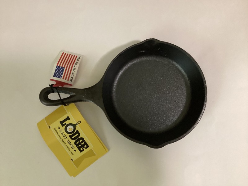 NEW Lodge 6-1/2 Inch Cast Iron  Skillet , Black  with advertising on back