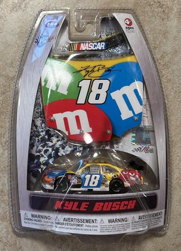 Unopened 2010 #18 Kyle Bush  1:64 scale dicast car and M&M Hood magnet. - Picture 1 of 2