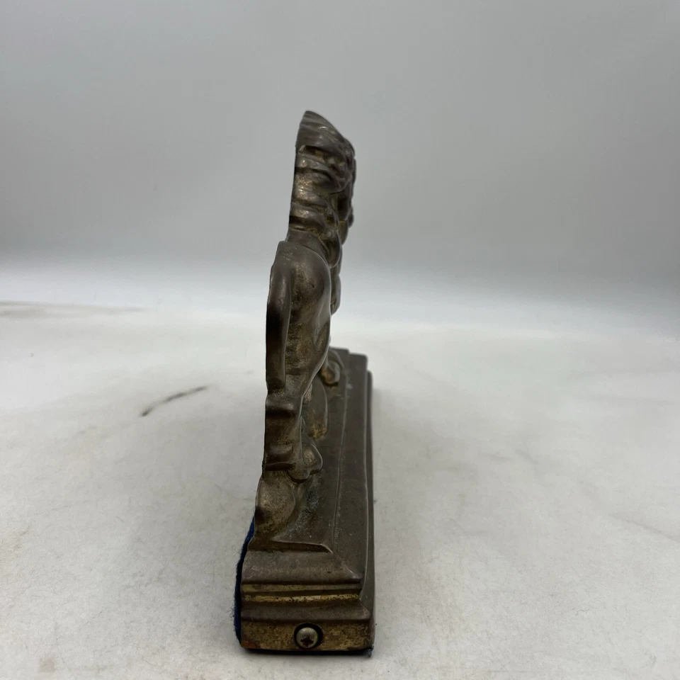 Tope de puerta vintage de latón fundido de metal león siglo XX Foto 4 de 4