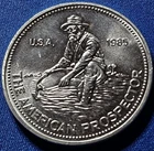 A 1985 Engelhard 1oz Silver American Prospector Round