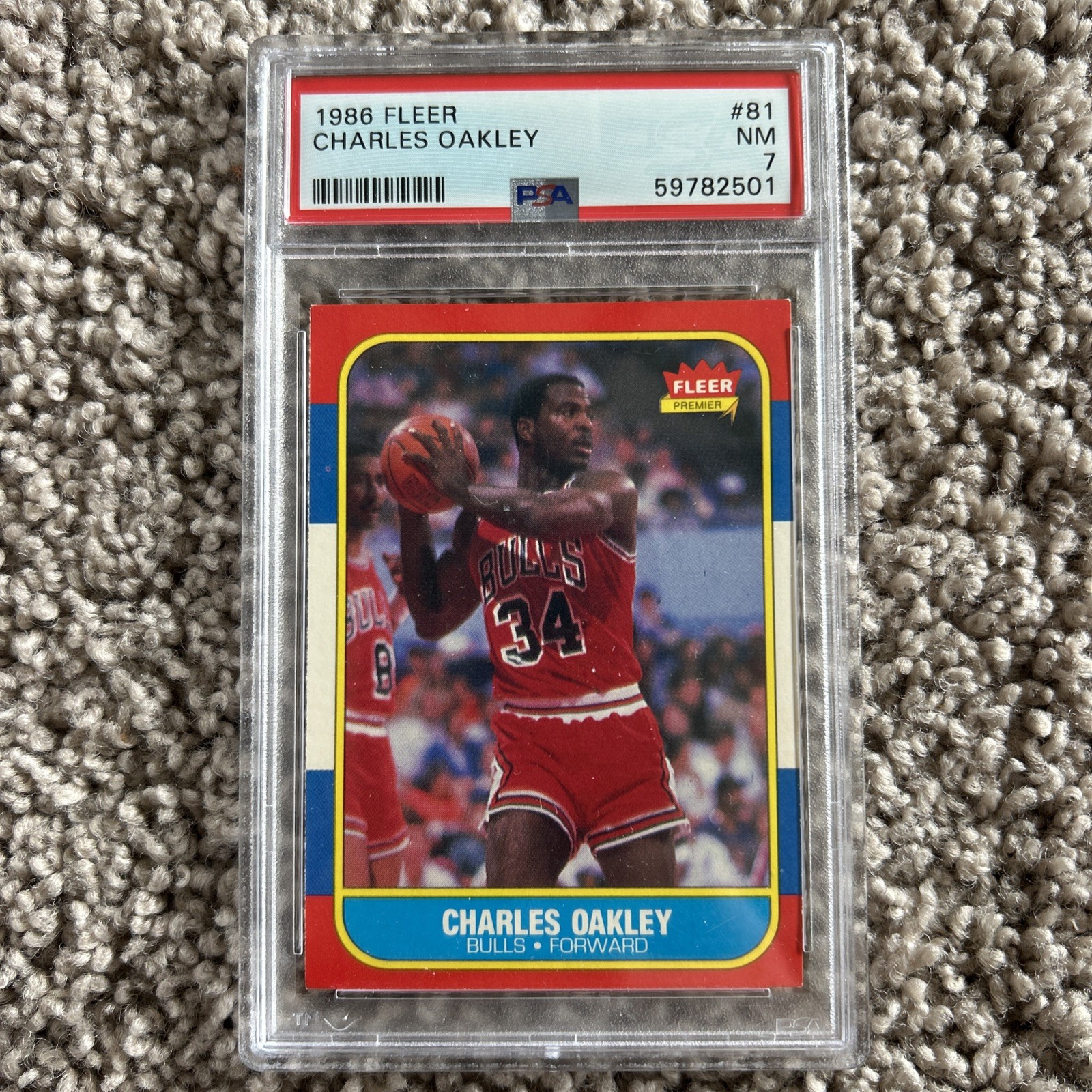 1986-87 Fleer Basketball Charles Oakley #81 (RC) New Label PSA 7