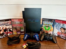 Sony PlayStation 2 bundle, games, controller's, and cords. tested WORKS