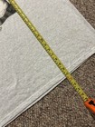 Yellow measuring tape on light gray VTG shirt, black cat design, text “You’re Mine!” Made in USA.