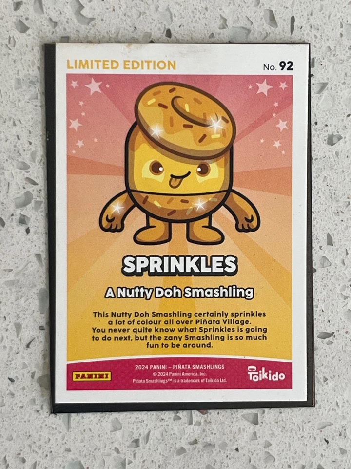 2024 PANINI PIÑATA SMASHINGS SERIE 1 RARO ORO SPRINKLES EDICIÓN LIMITADA TARJETA SSP Foto 2 de 2