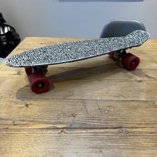 Rekon 22-inch complete mini cruiser skateboard featuring a zebra graphic deck.