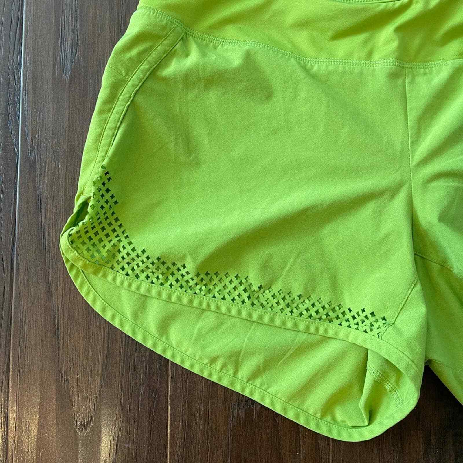Athleta lime green running shorts Gem