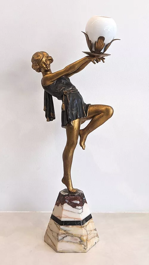 Art deco lamp lady holding ball deals