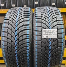 D'OCCASION : 2 PNEUS 4 SAISONS BRIDGESTONE 185/60 R15 88V XL M+S WEATHER CONT...
