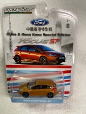 1/64 G.L..2012 FORD FOCUS ST/GOLD METALLIC/BLK INT/ALLOY WHEELS /RUBBER TIRES