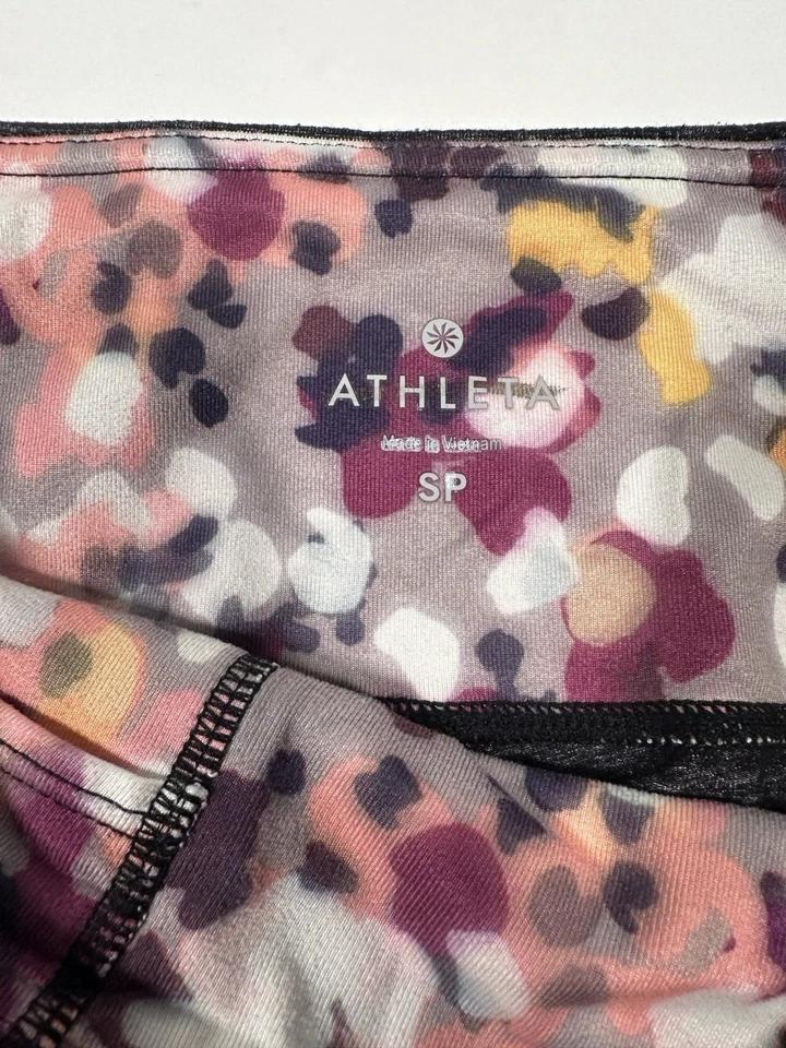 Leggings Athleta negros jaspeados con detalles multicolores Foto 3 de 4