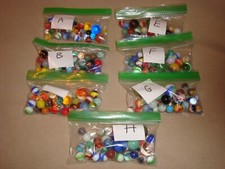38 Vintage Marble with at least 3 shooters you pick from letter group.