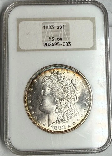 1883 MS64 near gem BU Morgan silver dollar. Old NGC fatboy soapbox holder. #q003