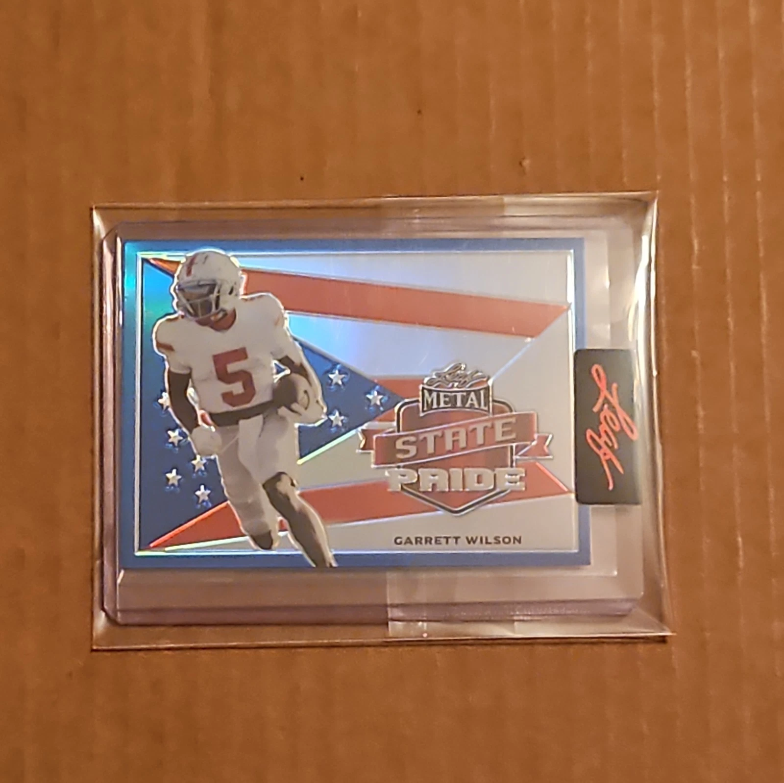 Garrett Wilson Leaf Draft Metal State Pride #SPGW1 Red White & Blue Wave