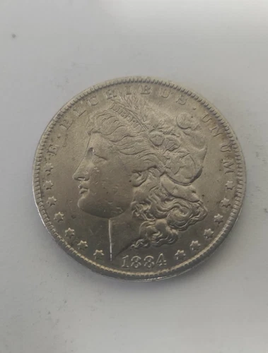 1884-O-Morgan $1 AU/UNC